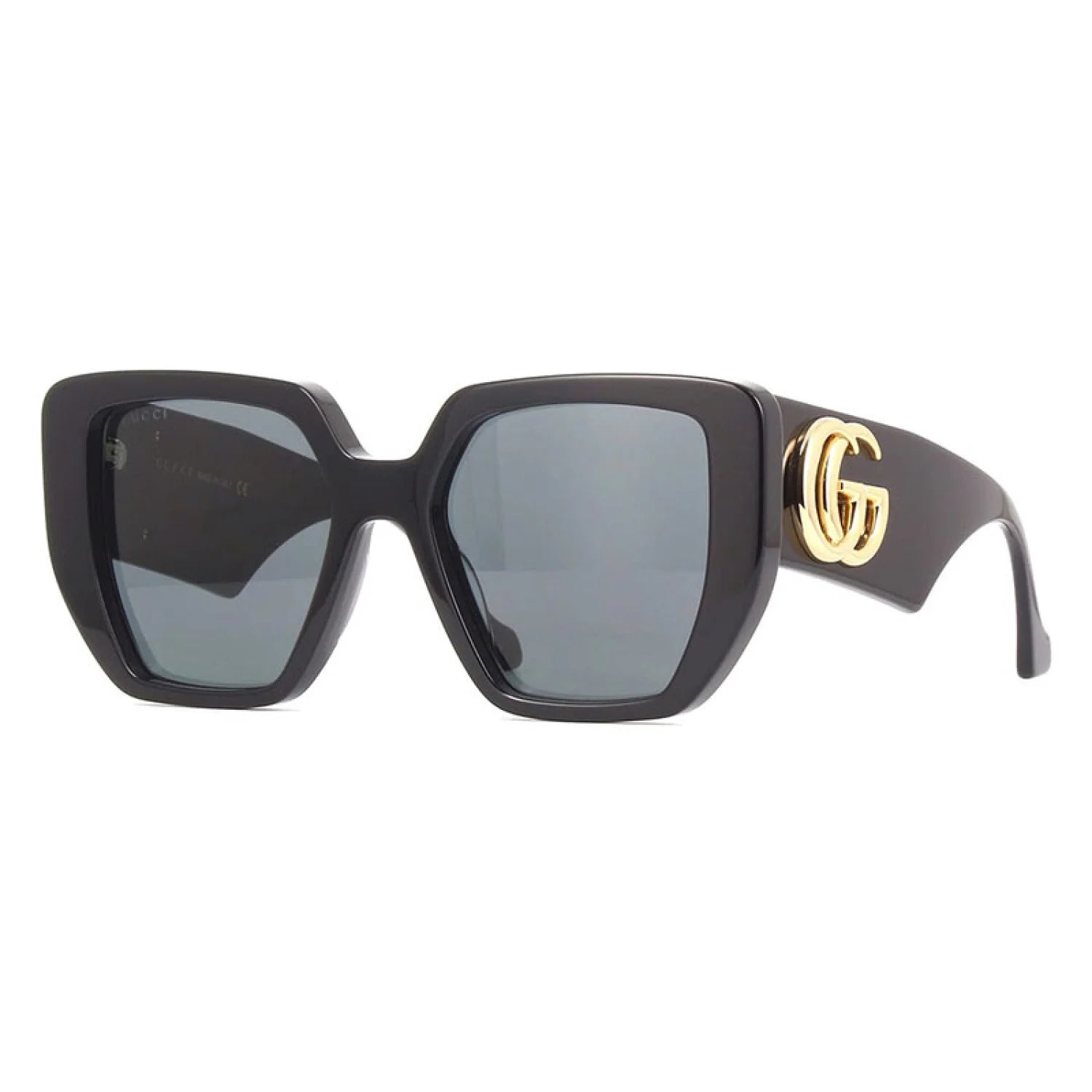 Black Gucci sunglasses with gold accents